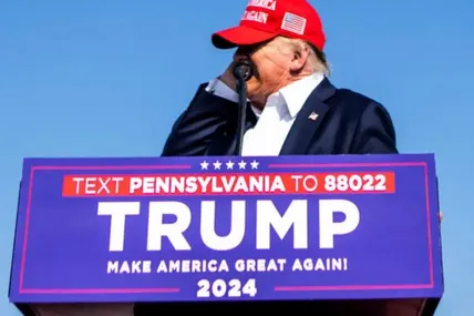Момент пострілу у Трампа.Фото із сайту The New York Times