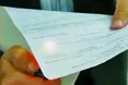Виборчі бюлетені світяться, як гроші