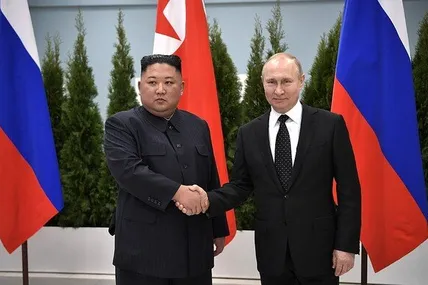 Кім Чен Ин та путін. Фото з меержі