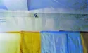 Над кабінками для голосування — відеокамера висить...