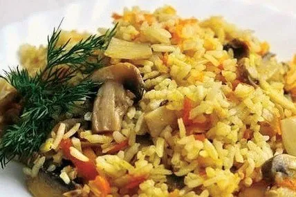Плов зі свинини із грибами