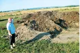 А над селом «пахне» курячим г...